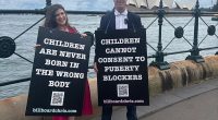 An activist known as Billboard Chris (right) who advocates against transgender treatment for minors is embroiled in an Australian push to censor his content on the American social media company X