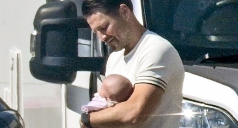 Mark Wright cradles baby Palma as doting dad visits Michelle Keegan on set of Brassic as she films final scenes