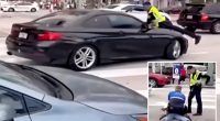 Miami police officer seen clinging to hood of car before shooting driver