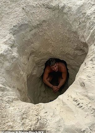 Airport worker Jensen Sturgeon was trying to dig as deep as he could on the famed beach at Rio de Janeiro but he struck water and the hole quickly collapsed around him.