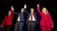 Even though it's all celebrations publicly over at Labor HQ, a brouhaha is breaking out within the new-look parliamentary party as the factional left and right go to war divvying up the spoils of victory. (Anthony Albanese, centre right, is pictured celebrating Saturday's election victory with his fiancée Jodie Haydon, right, son Nathan, centre left, and Senator Penny Wong, left)
