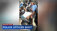 Philadelphia police officer shot near high school; video shows chaotic scene