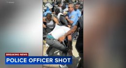 Philadelphia police officer shot near high school; video shows chaotic scene