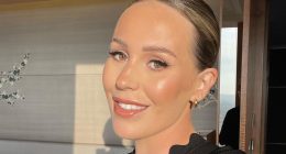 Proud stepmum Kate Ferdinand shares rare family snap as stepson TOWERS over her