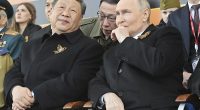 Russian President Vladimir Putin, right, and Chinese President Xi Jinping watch the Victory Day military parade in Moscow, Russia, Friday, May 9, 2025