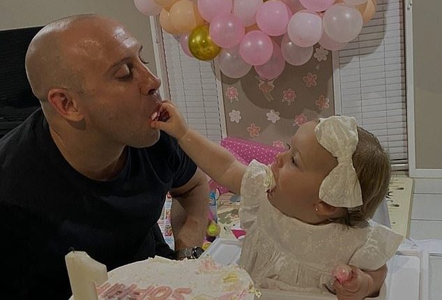 Shattered MMA fighter dad flies in after his daughter's horrific death - as the toddler was found dying in the front yard from 'multiple wounds' and her mum is charged with murder