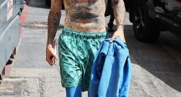 Justin Bieber left fans scratching their heads when he bizarrely stepped out in Los Angeles on Thursday while shirtless in Beverly Hills