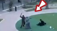 A man wielding a belt or leather strap rushes appears to attack women who were protesting