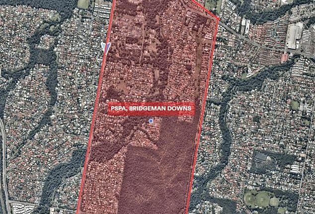 A man has been taken into custody following a tense police standoff that saw an emergency declaration issued in a Queensland suburb