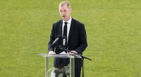 Adam Selwood is pictured addressing the crowd at his twin brother Troy's funeral in February