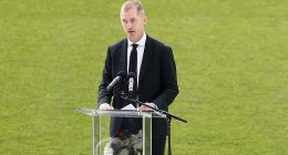 Adam Selwood is pictured addressing the crowd at his twin brother Troy's funeral in February