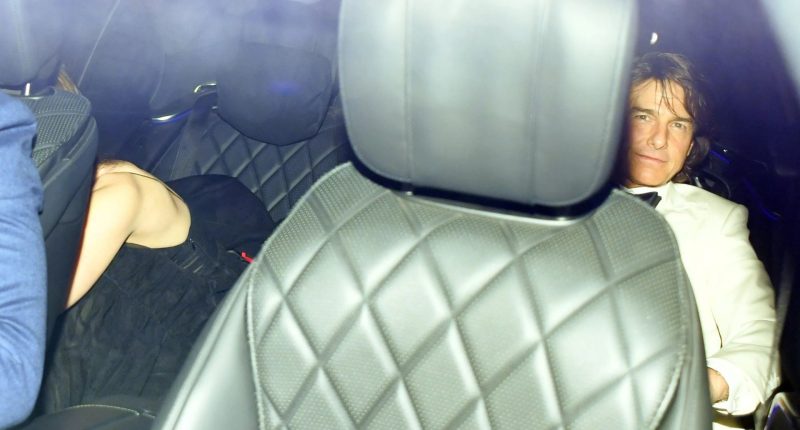 Tom Cruise makes desperate attempt to hide girlfriend Ana De Armas as they exit David Beckham’s 50th birthday party