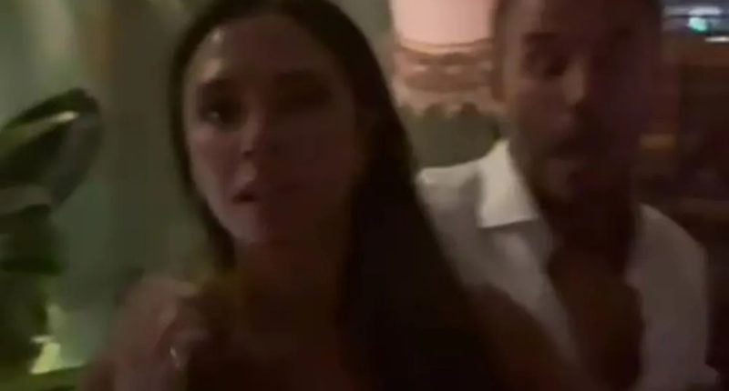 Victoria Beckham can’t keep her hands off husband David as they dance in a restaurant on his 50th birthday