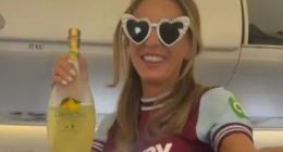Watch as Dani Dyer dances with booze on her flight to Ibiza as she wears West Ham kit on second hen do ahead of wedding