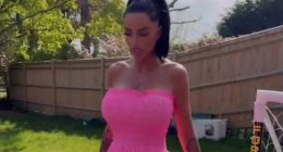 Watch moment Katie Price shoves aside cat with her FOOT as she models Barbie pink dress in her garden