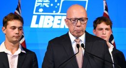A dejected Peter Dutton concedes defeat both in the federal election and in his own seat while flanked by his sons, Harry and Tom, on Saturday night