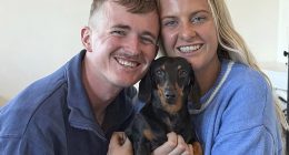 A world-famous and vagrant miniature dachshund was returned to her owners on Wednesday