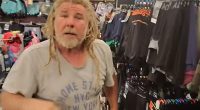 A Kmart customer pictured) confronted a prankster after being tricked into thinking money  had been stolen from him
