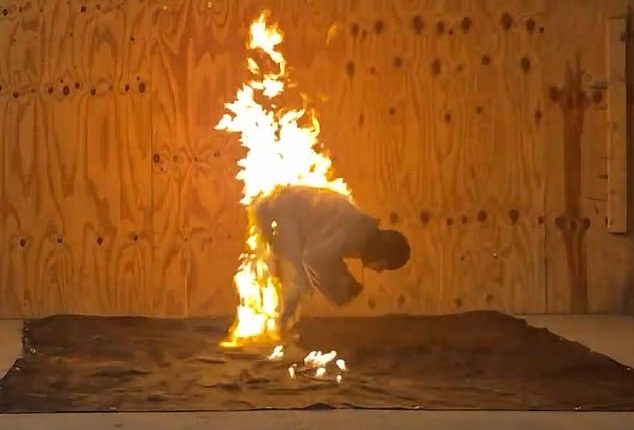 Ryan Luney pictured completing his world record feat of seven backflips in 30 seconds while on fire