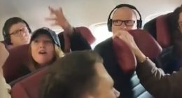 A Perth woman (above, gesturing at a stewardess) travelling from Western Australia to Melbourne was hauled off a plane before departure after a bizarre altercation with cabin crew