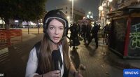ABC's North America correspondent Lauren Day (pictured) was hit by tear-gas as police tried to disperse protestors in Los Angeles