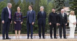 During a group photograph of the gathered leaders in the mountaintop Canadian town of Kananaskis on Wednesday, Anthony Albanese towered over his peers (pictured)
