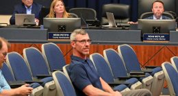 Deputy County Attorney Sean Moylan, right, at an April meeting of the County Commission. (© FlaglerLive)