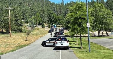 Police officers and firefighters who responded to the scene of a brush fire in Coeur d'Alene, Idaho were shot at on Sunday afternoon