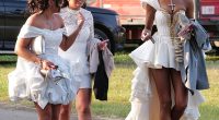 A group of glamorous racegoers swap their high heels for flip flops as they leave Ladies Day at Ascot