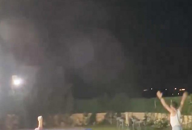 Revelers at a Lebanese pool party have been seen cheering and dancing as Iranian missiles flew over to hit Israel targets