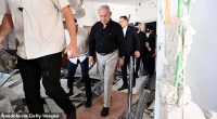 BAT YAM, ISRAEL  JUNE 15: (----EDITORIAL USE ONLY  MANDATORY CREDIT - 'AVI OHAYON / GPO / HANDOUT' - NO MARKETING NO ADVERTISING CAMPAIGNS - DISTRIBUTED AS A SERVICE TO CLIENTS----) Israeli Prime Minister Benjamin Netanyahu inspects demolished apartment buildings following Iran's launch of a ballistic missile attack against Israel in Bat Yam on June 15, 2025. (Photo by Avi Ohayon (GPO) / Handout/Anadolu via Getty Images)