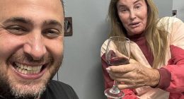 Caitlyn Jenner was drinking wine and texting members of her family while bombs rained down near her Tel Aviv hotel on Friday night, the Daily Mail can reveal