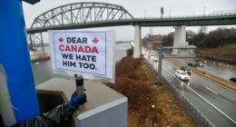 American ‘Elbows Up for Canada’ protesters gather near The Peace Bridge border crossing in Buffalo, N.Y., in April 2025.