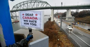American ‘Elbows Up for Canada’ protesters gather near The Peace Bridge border crossing in Buffalo, N.Y., in April 2025.