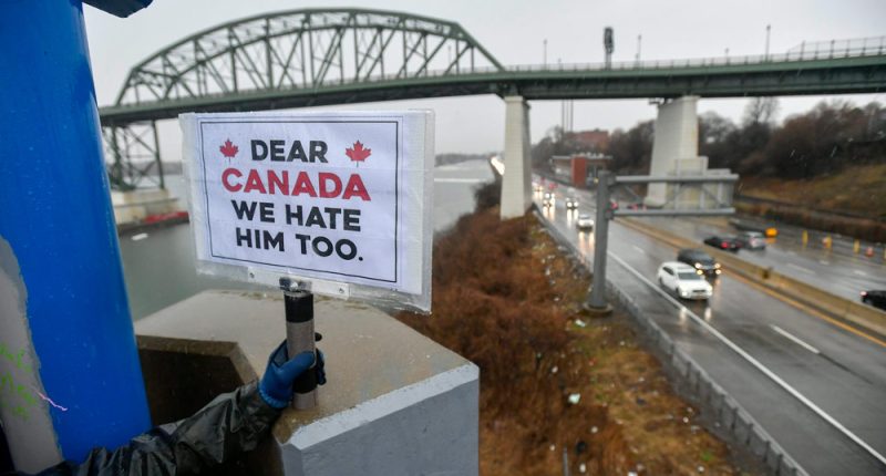 American ‘Elbows Up for Canada’ protesters gather near The Peace Bridge border crossing in Buffalo, N.Y., in April 2025.