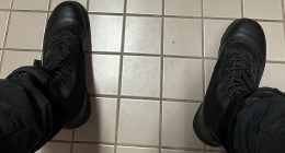 The shooter shared an image of his own feet clad in black leather combat boots while sat in a toilet cubicle on the third floor of the school moments before launching the attack