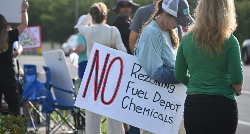 Protesters opposed to the rezoning demonstrated ahead of a Bunnell City Commission meeting last week. The item was not on the agenda. (© FlaglerLive)