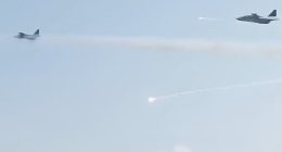 The footage shows heat trap flares and possible missiles from the Su-25s