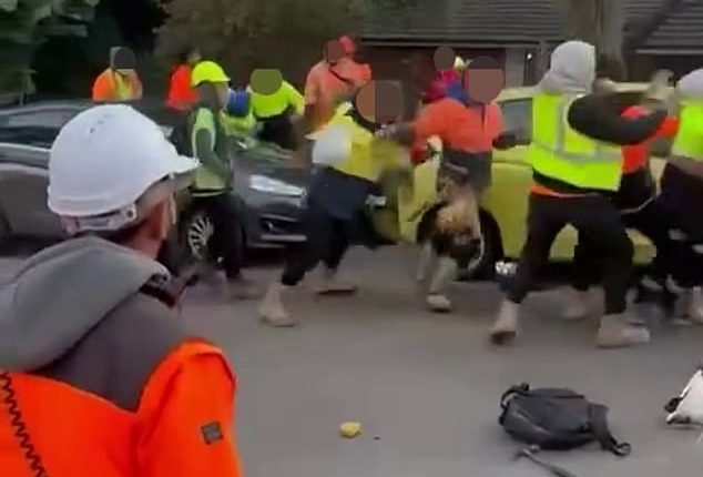 An altercation in Castle Hill saw over 20 tradies pushing and shoving each other (pictured)