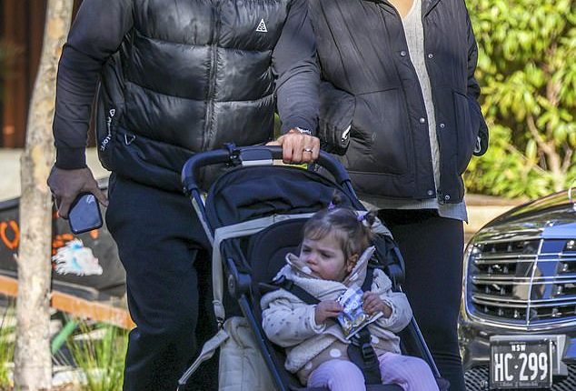 NRL star James Tedesco and his wife Maria were spotted enjoying a family day this week at Sydney's Taronga Zoo with their daughter Rosie (pictured)