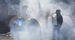 PORTLAND, OREGON: Tear gas surround tents outside the U.S. Immigration and Customs building during a protest in Portland, Oregon on Saturday