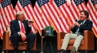 Republican presidential nominee and former U.S. President Donald Trump participates in a fireside chat with Tucker Carlson