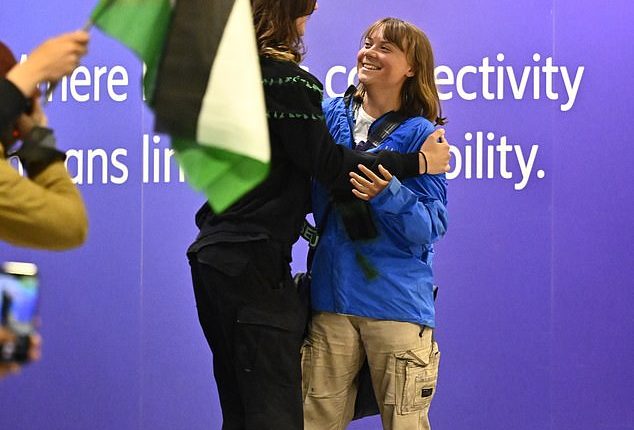 Swedish activist Greta Thunberg (R) arrives at Arlanda airport outside Stockholm, Sweden, on June 10, 2025