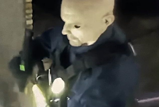Terrifying new images show the suspect behind Saturday's ‘politically motivated assassinations’ wearing a creepy Halloween-style mask while launching his killing spree