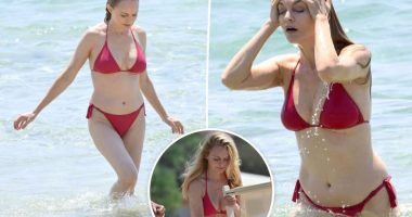 Heather Graham, 55, beats the heat in tiny red bikini during beach day in Sardinia