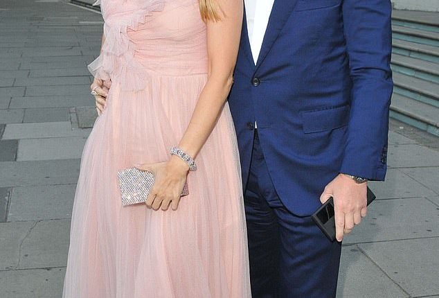 Holly Valance, 42, has reportledy split from billionaire property tycoon husband Nick Candy, 52, after 13 years of marriage (pictured together 2022)