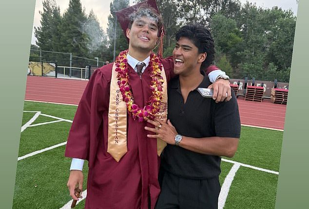 Pia posted a snap on Thursday of Lennox (left) blowing out a cloud of smoke while posing for a picture with his brother Isaiah (right)