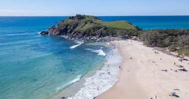 Horror at holiday beach as teenage boy is attacked by a shark