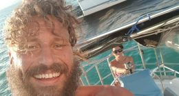 Thomas Goertz says he is exactly what he looks like - a carefree, seasoned sailor who loves the independence and romance of chasing adventure on the high seas. He is pictured with partner Jade Ormiston