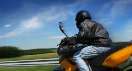 If You See A Motorcyclist Point Their Thumb Toward Their Helmet, Here's What It Means